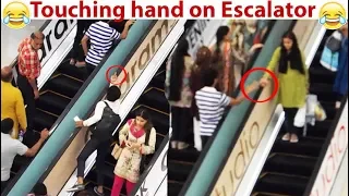 Touching Hands of Strangers on Escalator Prank in Pakistan gone wrong | Zero Pranks