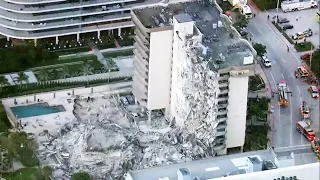 Nearly 100 missing after Florida building collapse as rescuers search through rubble