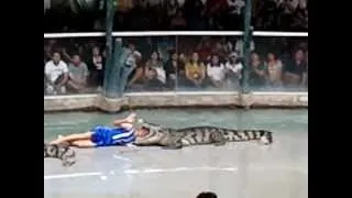 Girl & Guy Puts Head in Crocodile Mouth