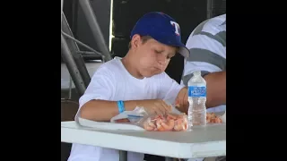 Kid sets the WORLD RECORD for most shrimp eaten in one minute