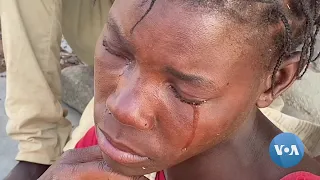 Desalojados em Nampula choram depois de verem as suas residências destruídas