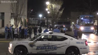 Small crowd greets UK players upon arrival at dorms