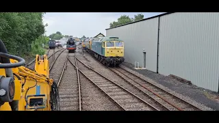 47367 and 47596 moving off the pit at Dereham for 80078