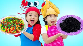 Suri and Annie Playing with Colorful PlayDoh Noodles