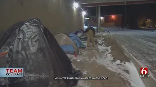 Volunteers Helping Homeless In The Cold During Severe Winter Weather