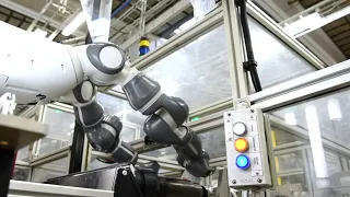 Collaborative robot in a production line, YuMi robot