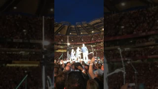 Coldplay Dublin 2017 guitarist hit by beer bottle