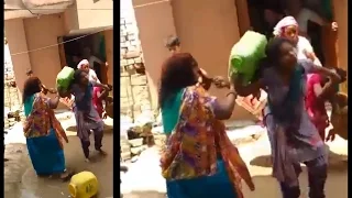 Delhi's residents fighting to take water first in Mahipalpur, Watch viral video | Oneindia News