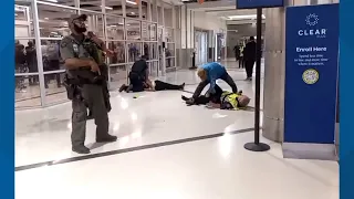 Witness describes moments woman stabbed APD officer just feet from her inside Atlanta airport