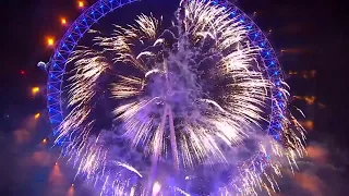 London's Big Ben rings in the New Year and fireworks light up the sky