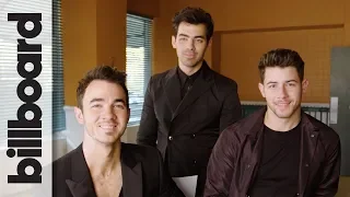 Jonas Brothers Joke About Pranking Each Other & Laugh at Their 2000s Haircuts | Billboard