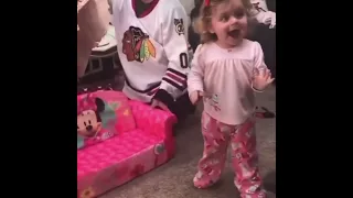 Baby girl exited to see own gift