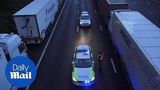 Police patrol massive lorry corridor queue from closed borders