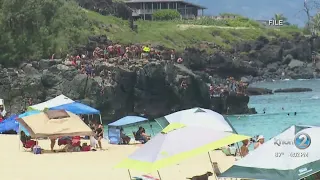 California visitor injured after jumping off Waimea Bay rock and landing on his face, stomach