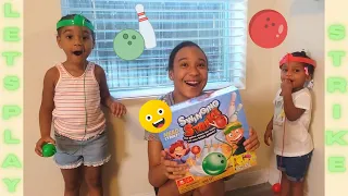 NEW FAMILY GAMES REVIEW PART 1|SWINGING STRIKE!!!!