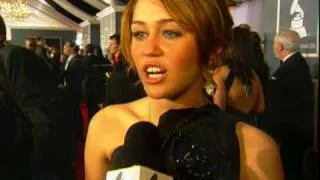 Miley Cyrus on the red carpet at the 51st GRAMMYs