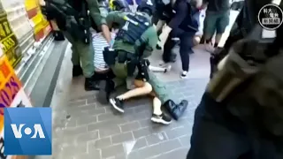 Hong Kong Police Tackle School Girl Amid Protests