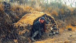 Camping alone in heavy rain and building an underground shelter. Bushcraft. Camping in the rain