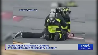 Plane makes emergency landing at LGA