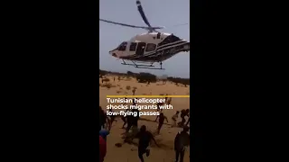 Tunisian helicopter 'buzzes’ migrants with low-flying passes | AJ #shorts