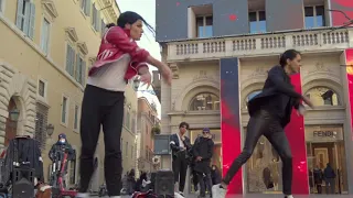 A Michael Jackson impersonator dancing with a girl! Perfect dance