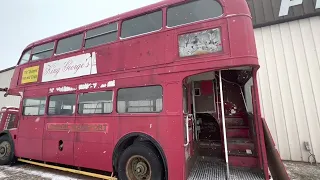 Checking out a 1950 Double Decker Bus for sale