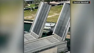Man caught on video scaling upright Miami bridge