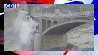 Incredible moment bridge swept away by glacier lake outburst