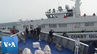 Chinese Coast Guard Ship Nearly Collides with Philippines Patrol Ship in South China Sea | VOA News