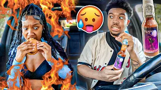 PUTTING THE WORLDS HOTTEST HOT SAUCE ON MY ANGRY GIRLFRIENDS FOOD!