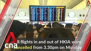 Hong Kong airport authorities deal with backlog after protest shutdown