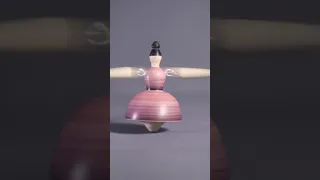 Woodturning a ballerina spinning top