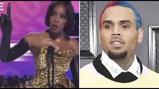 Kelly Rowland CHECKS The AMA For BOOING CHRIS BROWN After Winning Award & Gives Chris His Flowers