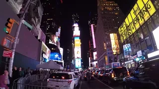 Dear NYPD: Please give New Yorkers the Times Square bike lane back ; Cycling Times Square at night