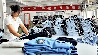 The process of mass production of school uniforms, a good clothing factory