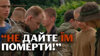 "Я вірю, що він живий!" - родичі азовців з Оленівки стали на коліна, просячи світ вплинути на росію