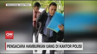 Pengacara Hamburkan Uang di Kantor Polisi