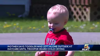 Mother says toddler left outside daycare, trooper came to rescue