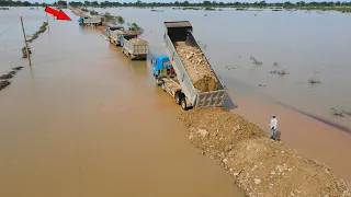 Nice Updating Using Bulldozer and Huge Dump Truck Working Building Road Long Crossing Flood