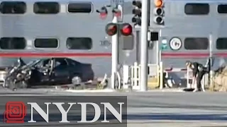 California cop saves driver moments before train hits car