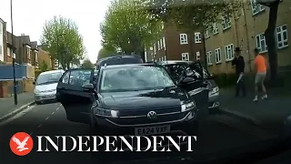 Moment four men appear to try and 'force Jewish pedestrian into car boot' in London