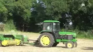 Baling hay with a JD 2650 & JD 359 Baler 2010