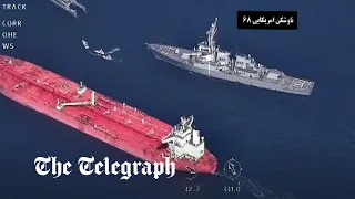 US warship and Iranian forces in stand-off over oil tanker