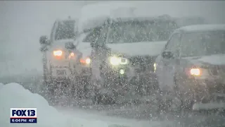 Early spring snowfall hampers drivers on Snoqualmie Pass | FOX 13 Seattle