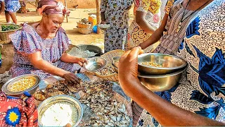 Rural market day in Togo where people still practice the trade by barter system. No cash allowed