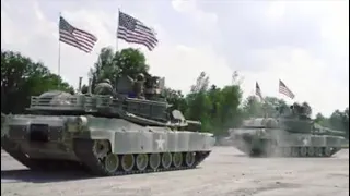 United States M1A2, British Challenger II, and Poland's Leopard 2A5 tanks crushing and tearing