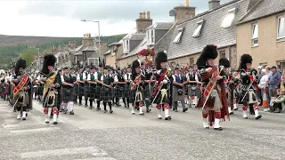 Thundering sound of the Massed Pipes and Drums marching after the 2022 Dufftown Highland Games