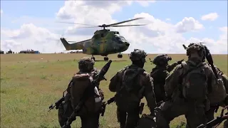 US Army CH-47D Chinooks and UH-60L Black Hawks training with Romanian IAR 330