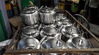 Whistling kettle mass production process. Stainless steel plant in South Korea.