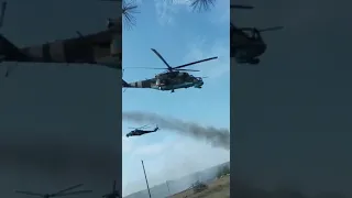 Ukrainian helicopters Mi-24 support infantry on the ground